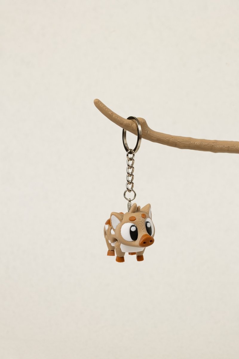 Брелок африканська свиня - Education Cards