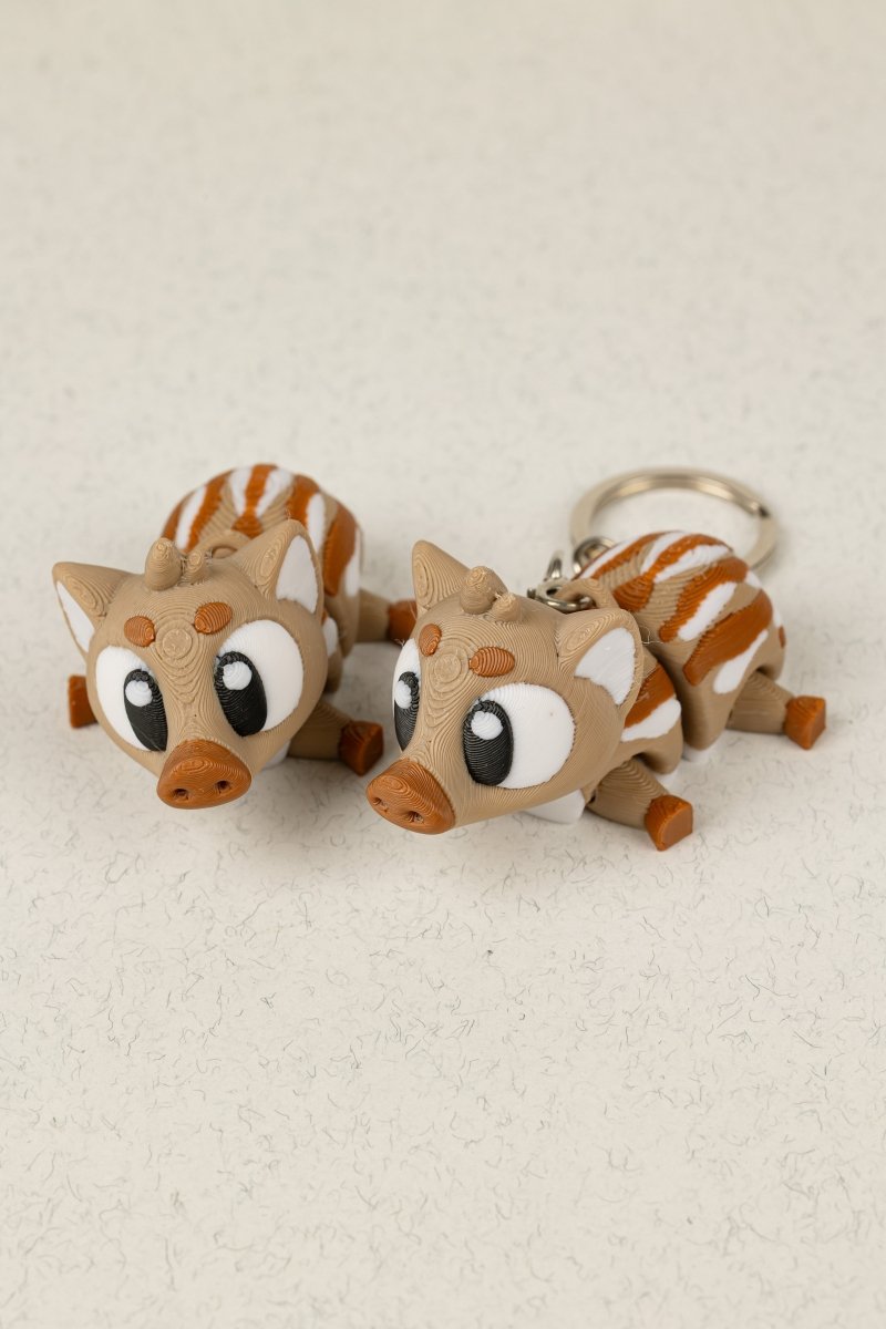 Брелок африканська свиня - Education Cards